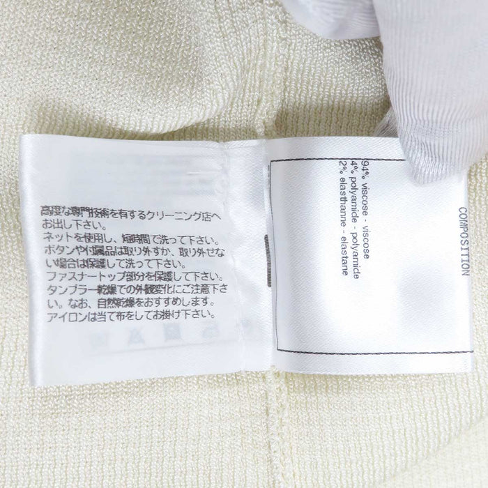 CHANEL 
COCO CC bottone colore oro chiaro metallo colore argento 
marchio Coco giacca di maglia