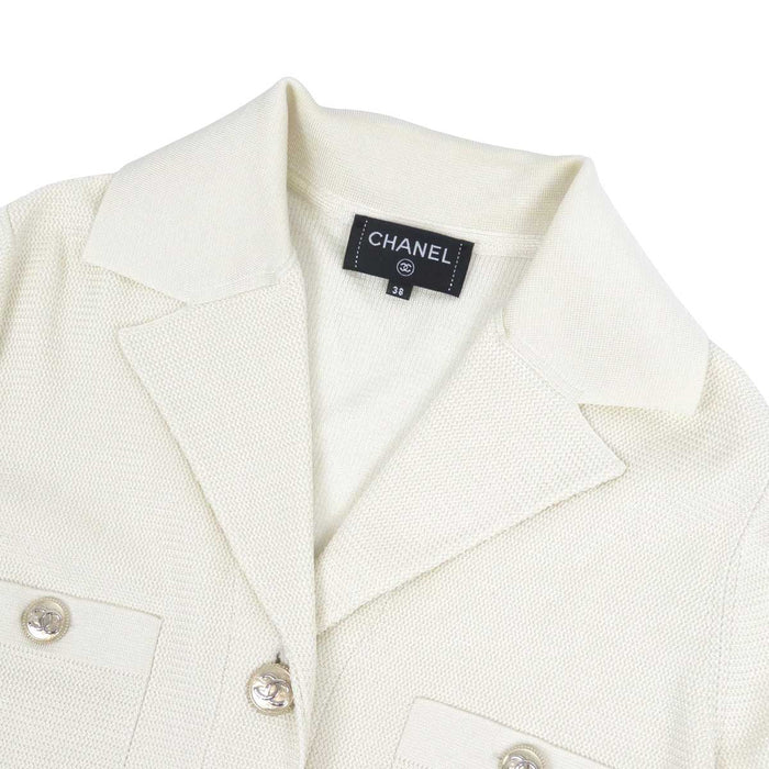 CHANEL 
COCO CC bottone colore oro chiaro metallo colore argento 
marchio Coco giacca di maglia