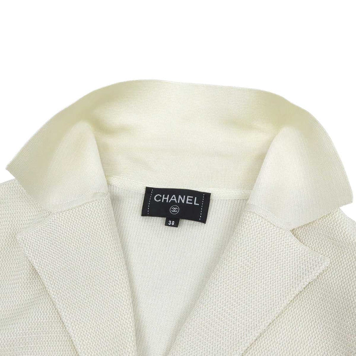 CHANEL 
COCO CC bottone colore oro chiaro metallo colore argento 
marchio Coco giacca di maglia