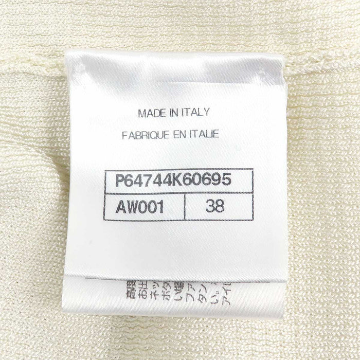 CHANEL 
COCO CC bottone colore oro chiaro metallo colore argento 
marchio Coco giacca di maglia