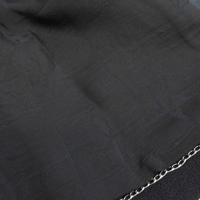 CHANEL 
COCO CC bottone 09C rever di seta 
marchio Coco giacca di lana