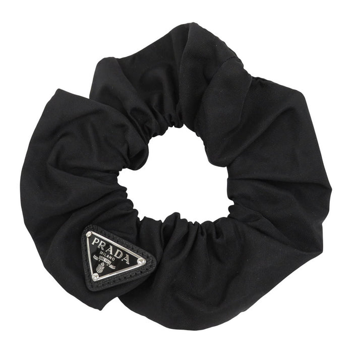 PRADA 
Logo triangle Re-Nylon 
Chouchou Re-Nylon