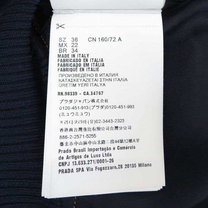 MIUMIU 
Logo ricamato giacca in denim lavato cropped con zip 
Giacca in denim blouson