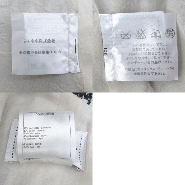 CHANEL 
COCO CC manica a tre quarti 
camelia tweed monospalla abito