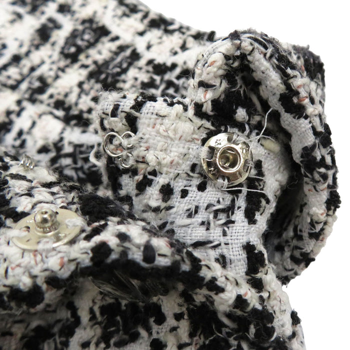 CHANEL 
COCO CC manica a tre quarti 
camelia tweed monospalla abito