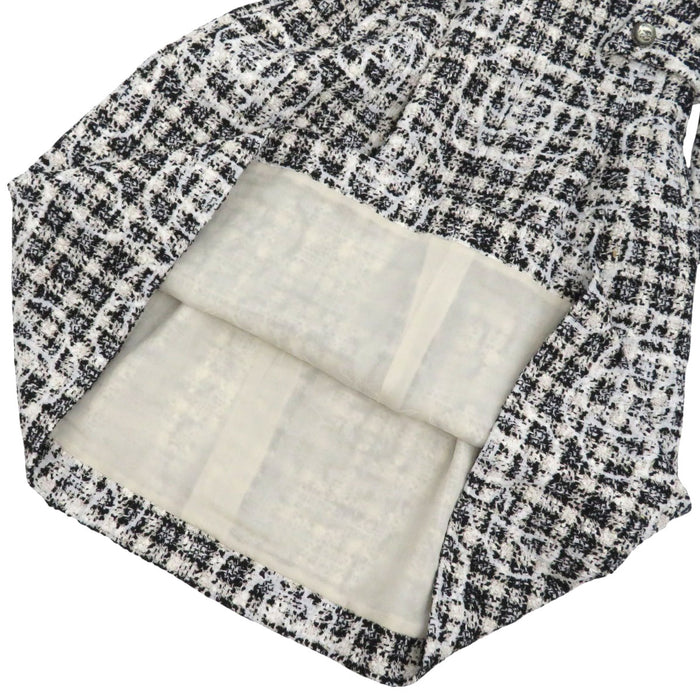 CHANEL 
COCO CC manica a tre quarti 
camelia tweed monospalla abito