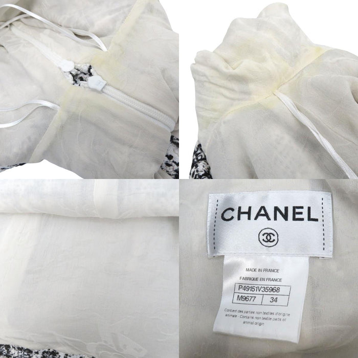 CHANEL 
COCO CC manica a tre quarti 
camelia tweed monospalla abito