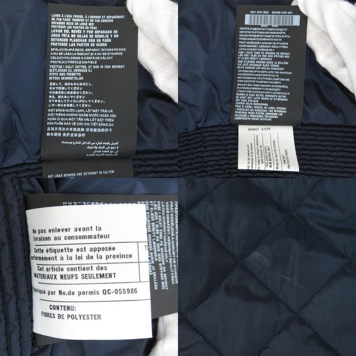 PRADA
High-neck zip-up nylon
Triangle logo padded jacket