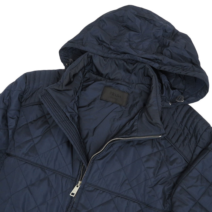 PRADA
High-neck zip-up nylon
Triangle logo padded jacket