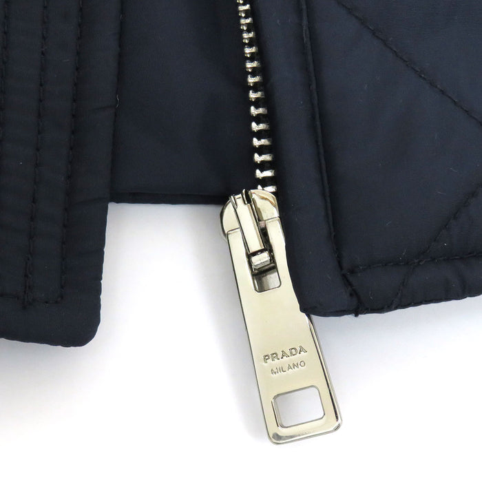 PRADA
High-neck zip-up nylon
Triangle logo padded jacket