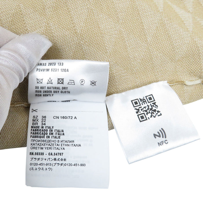 PRADA
Cropped length cotton knit
Logo half-sleeve cut and sewn