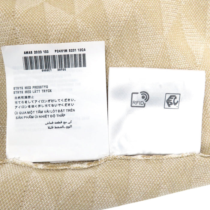 PRADA
Cropped length cotton knit
Logo half-sleeve cut and sewn