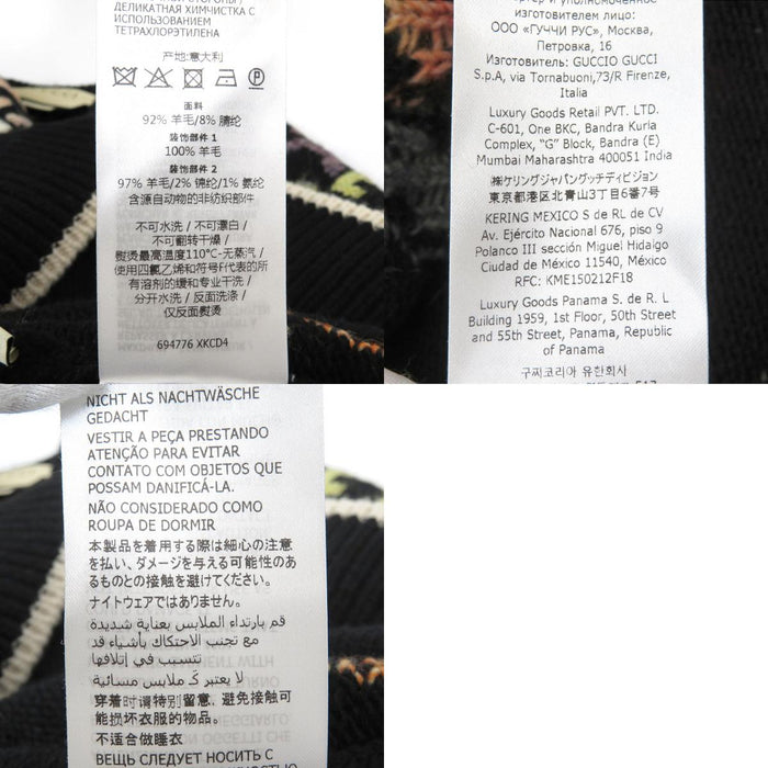 GUCCI 
Maglione in lana a motivo totale 
Cardigan multicolore in jacquard GG