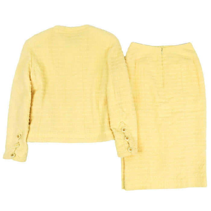 CHANEL 
COCO CC Bottone Coco Giacca senza colletto con fiocco in misto alpaca 93P 
Set vintage in lana con logo Coco