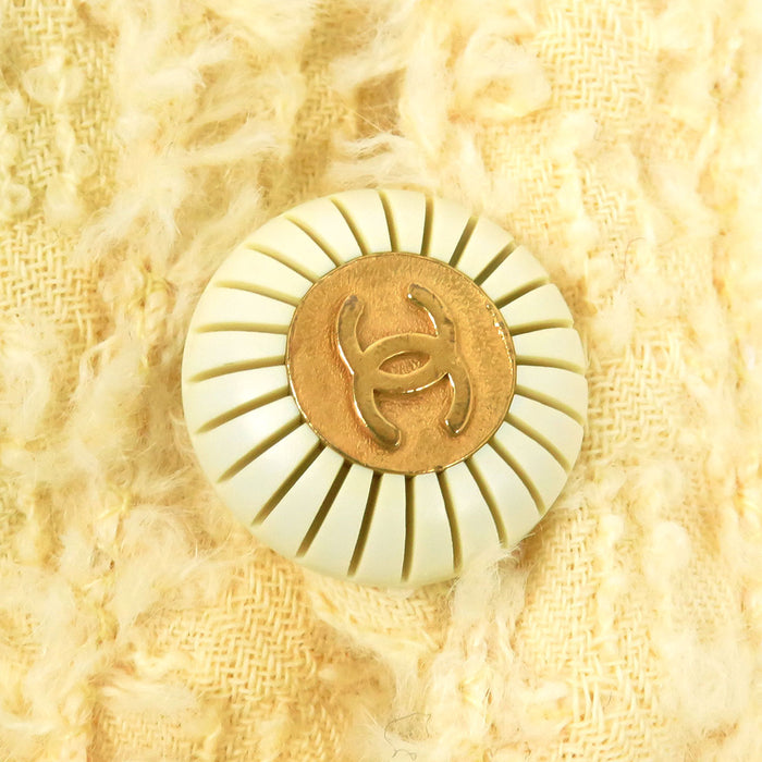 CHANEL 
COCO CC Bottone Coco Giacca senza colletto con fiocco in misto alpaca 93P 
Set vintage in lana con logo Coco