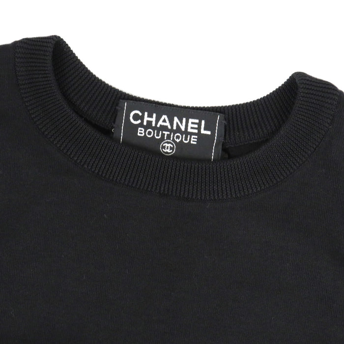 CHANEL 
COCO CC logo 5 19 31 
Gilet in maglia con logo Coco