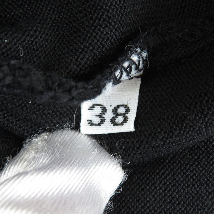 CHANEL 
COCO CC logo 5 19 31 
Gilet in maglia con logo Coco