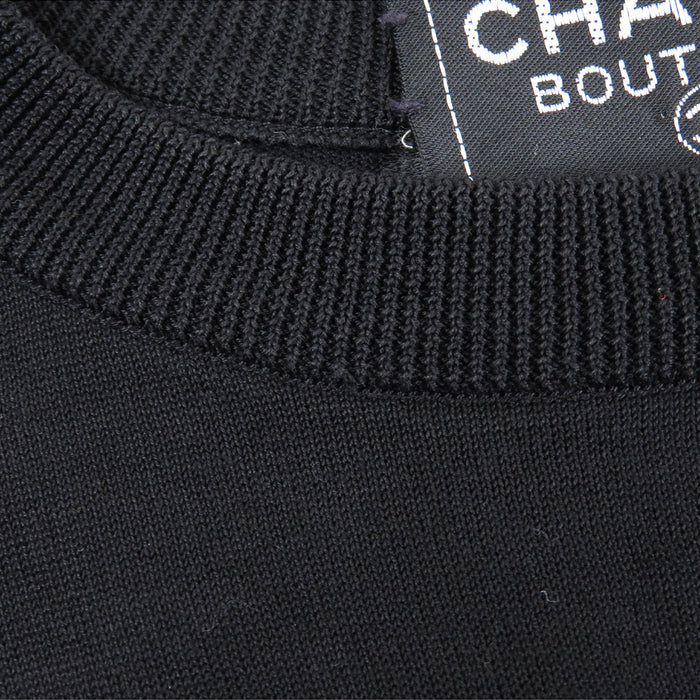 CHANEL 
COCO CC logo 5 19 31 
Gilet in maglia con logo Coco