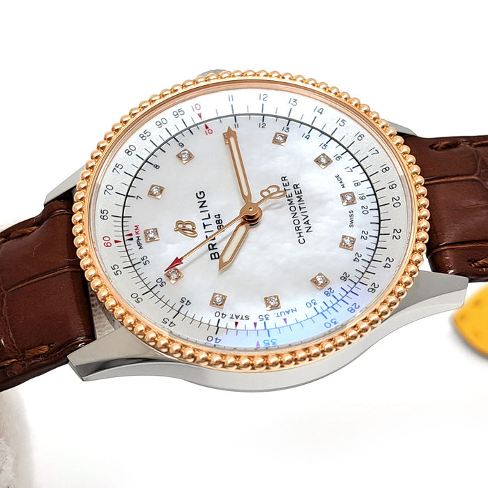 BREITLING 
Navitimer Automatic 35 Shell Dial 
With Box and Warranty Card