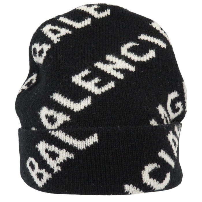 BALENCIAGA 
Laine à motif intégral 
Bonnet en tricot avec logo intégral