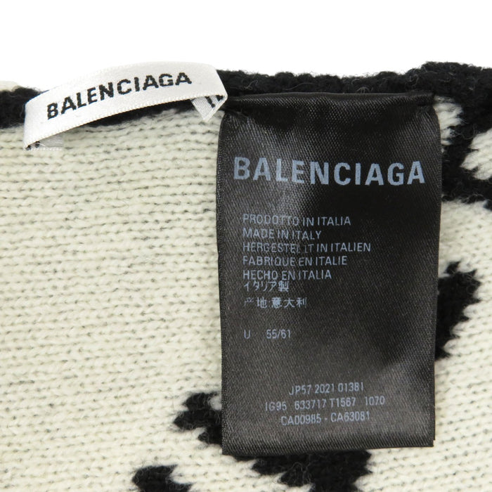 BALENCIAGA 
Laine à motif intégral 
Bonnet en tricot avec logo intégral