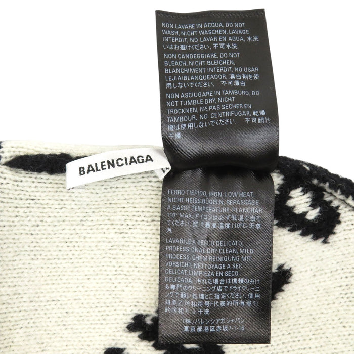 BALENCIAGA 
Laine à motif intégral 
Bonnet en tricot avec logo intégral