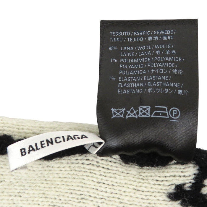 BALENCIAGA 
Laine à motif intégral 
Bonnet en tricot avec logo intégral