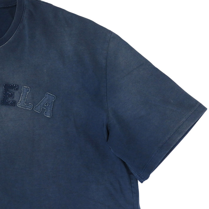 Maison Margiela  
破损加工  
宽松过染标志T恤