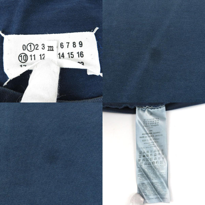 Maison Margiela  
破损加工  
宽松过染标志T恤