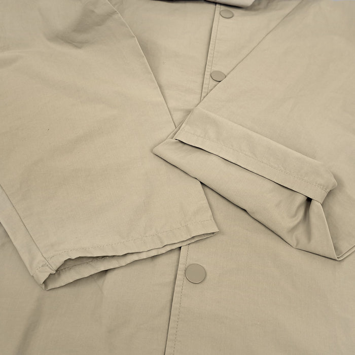 Fear of God 
Essenziali Logo Cotone Nylon 
Giacca Coach Collaborazione ESSENTIALS