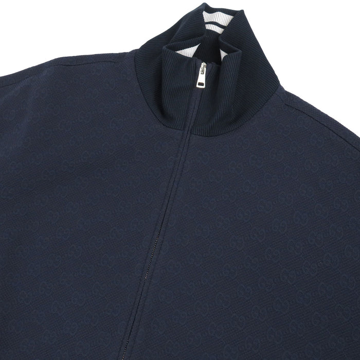 GUCCI
Giacca con zip in nylon tecnico GG a collo alto con logo a motivo integrale