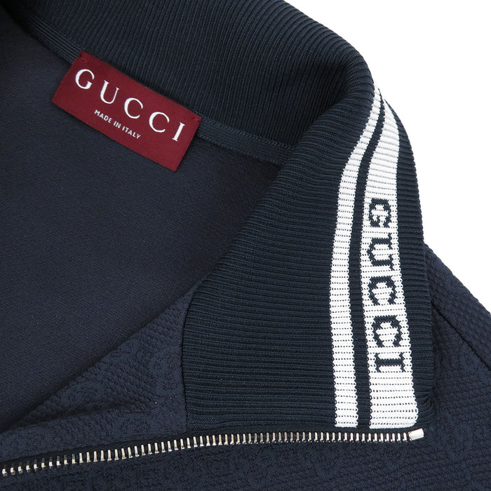 GUCCI
Giacca con zip in nylon tecnico GG a collo alto con logo a motivo integrale