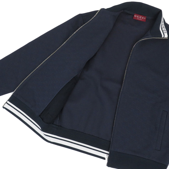 GUCCI
Giacca con zip in nylon tecnico GG a collo alto con logo a motivo integrale