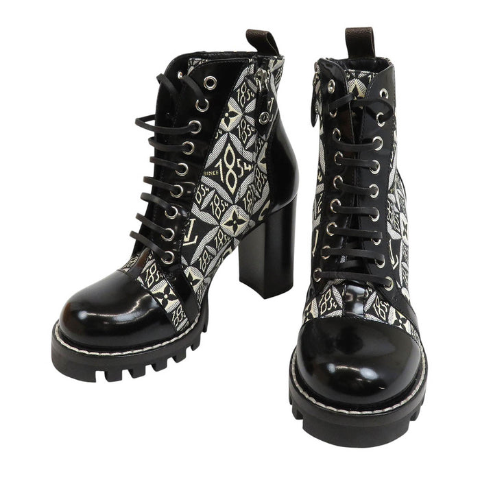 LOUIS VUITTON 
LV 1854 Logo Lacets 
Bottes Cheville Star Trail 
Monogramme