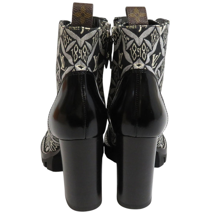 LOUIS VUITTON 
LV 1854 ロゴ レースアップ 
スタートレイル アンクルブーツ 
モノグラム