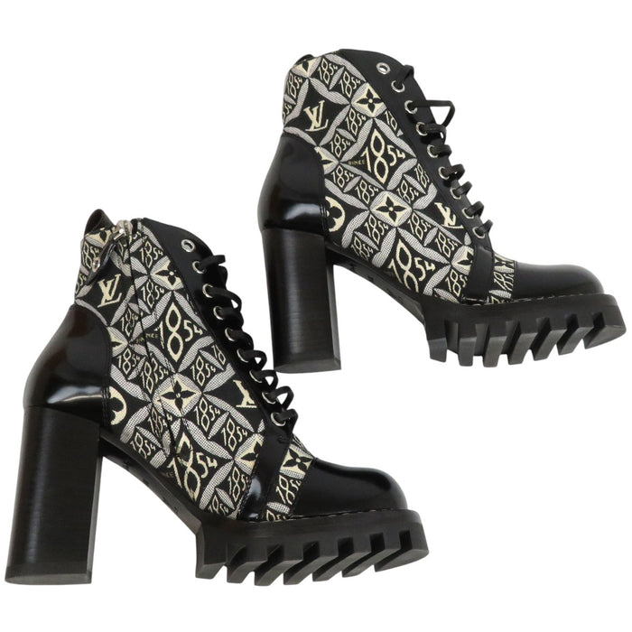 LOUIS VUITTON 
LV 1854 ロゴ レースアップ 
スタートレイル アンクルブーツ 
モノグラム