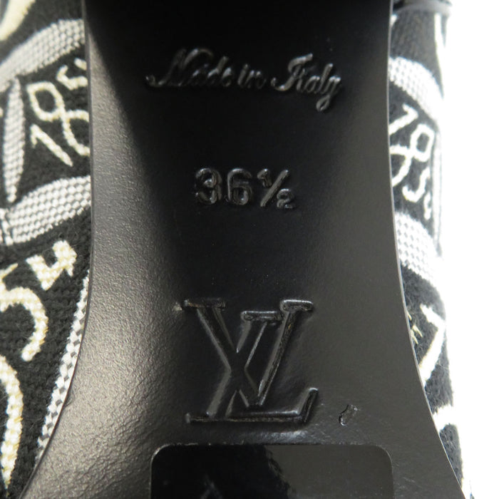 LOUIS VUITTON 
LV 1854 Logo Lacets 
Bottes Cheville Star Trail 
Monogramme