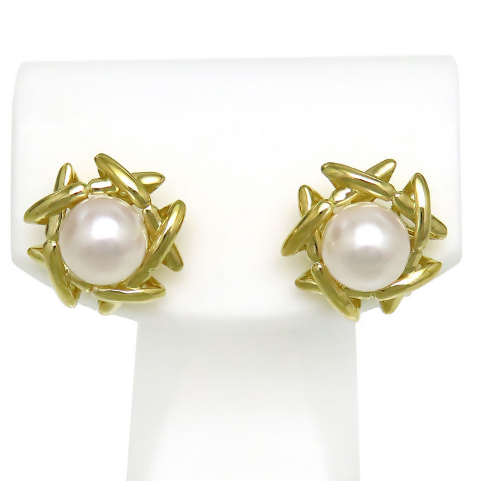 TIFFANY&Co. 
Kiss Around Pearl Earrings