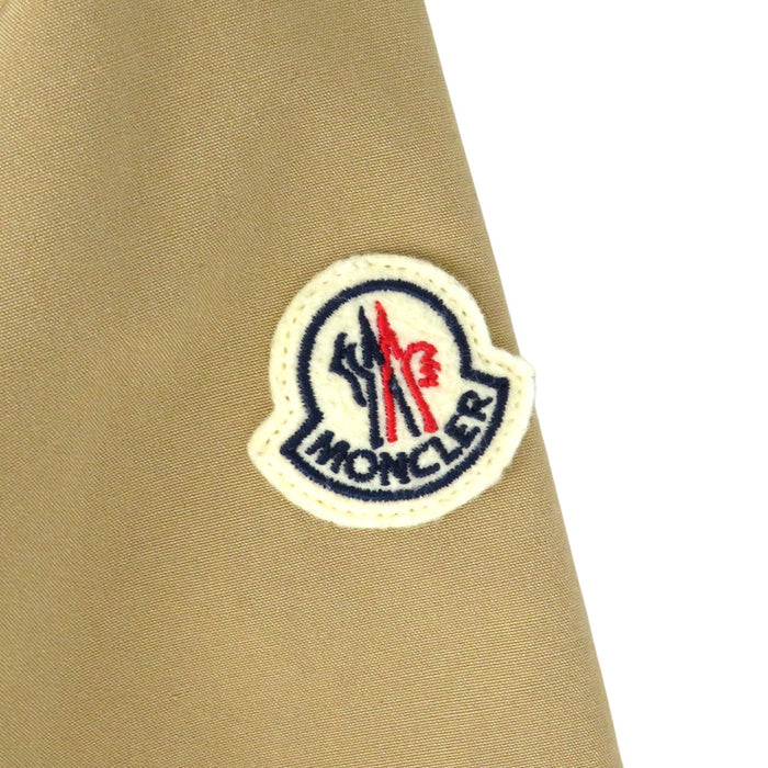 MONCLER 
Écusson Capuche Bouton Logo Polyester fabriqué en 2022 
TREBERON Veste à capuche Treberon