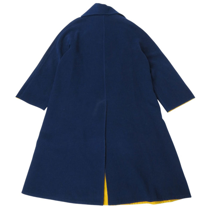 HERMES 
Cintura in pelle con bottoni Serie, misto cashmere 
Cappotto lungo in lana