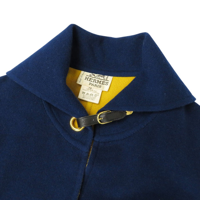 HERMES 
Cintura in pelle con bottoni Serie, misto cashmere 
Cappotto lungo in lana