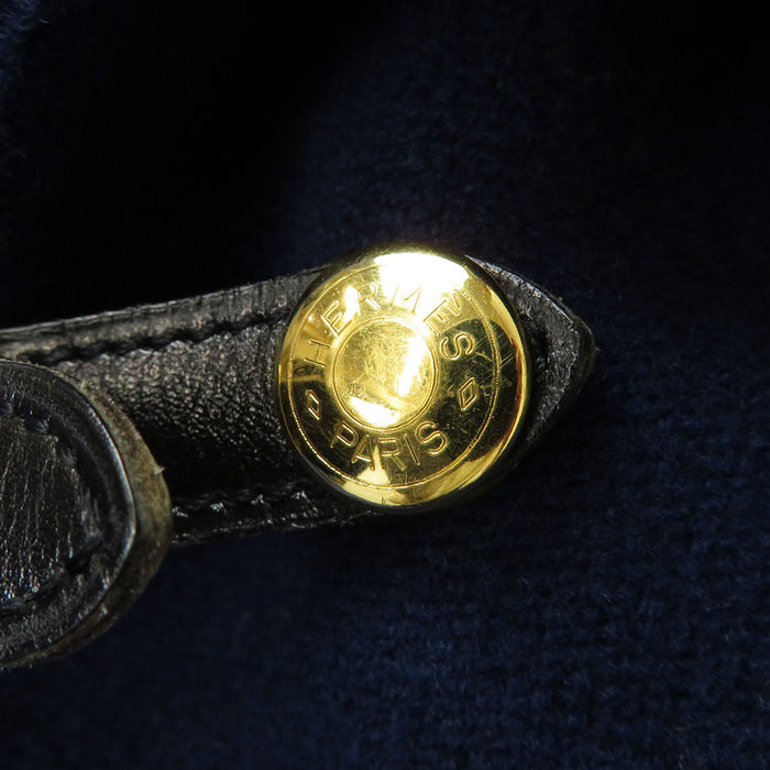 HERMES 
Cintura in pelle con bottoni Serie, misto cashmere 
Cappotto lungo in lana