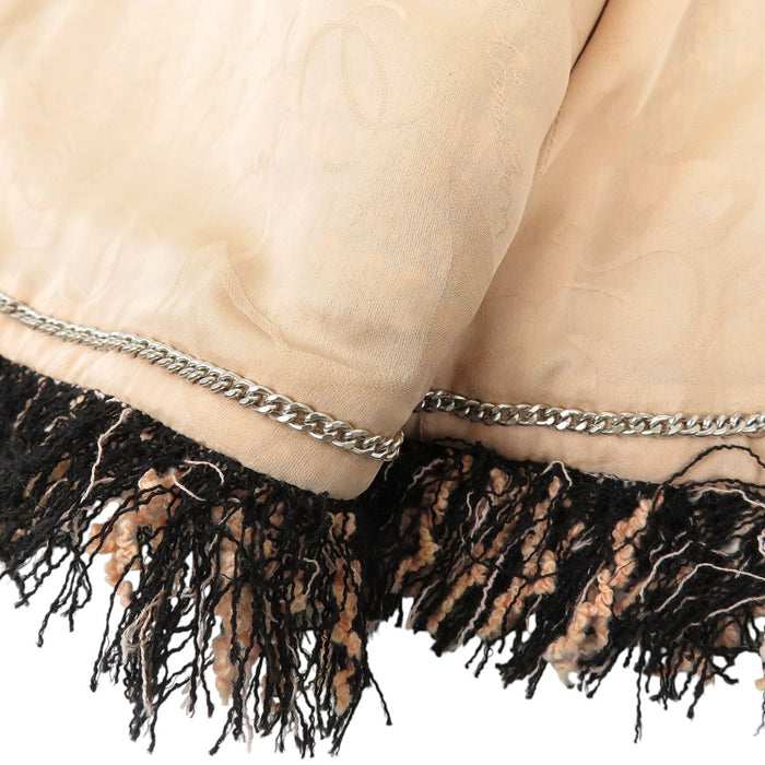 CHANEL 
COCO CC ロゴボタン フリンジ 七分袖 
ココマーク ツイード ノーカラージャケット