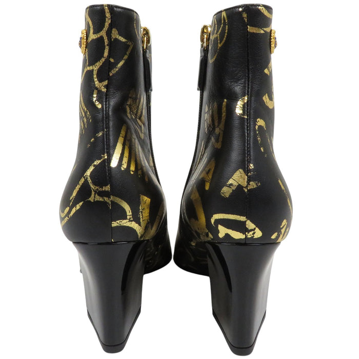 CHANEL 
COCO CC ゴールドカラー金具 パテントレザー 
ココマーク カメリア ショートブーツ