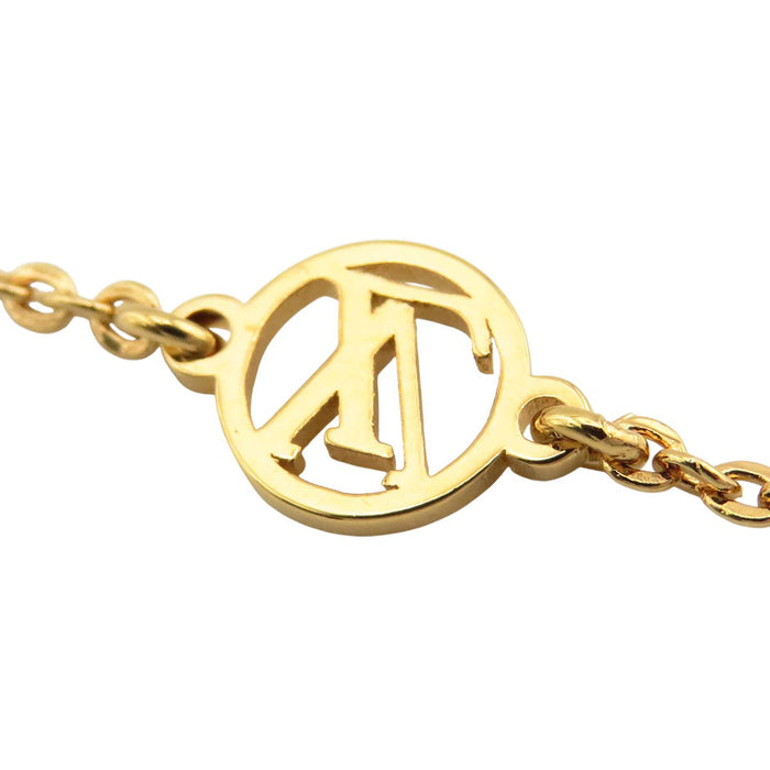 LOUIS VUITTON 
LV Circle Emblem Gold-Colored Metal 
Nanogram Bracelet 
Monogram