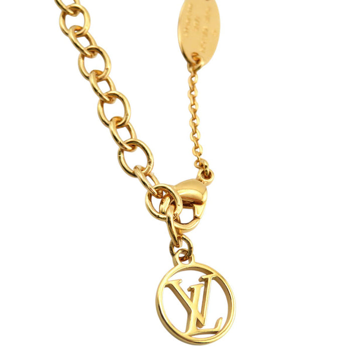 LOUIS VUITTON 
LV Circle Emblem Gold-Colored Metal 
Nanogram Bracelet 
Monogram
