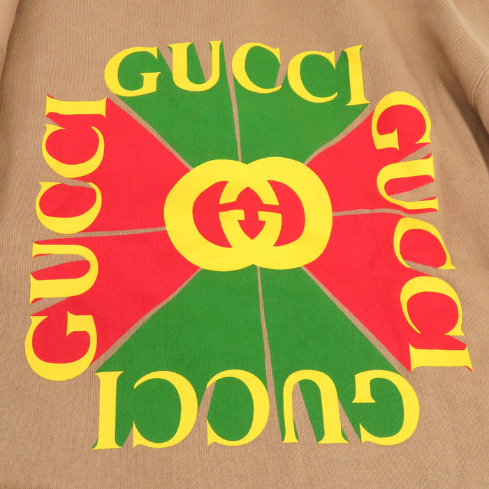 GUCCI 
Sweat à capuche 
Veste à demi-fermeture éclair avec logo imprimé au dos
