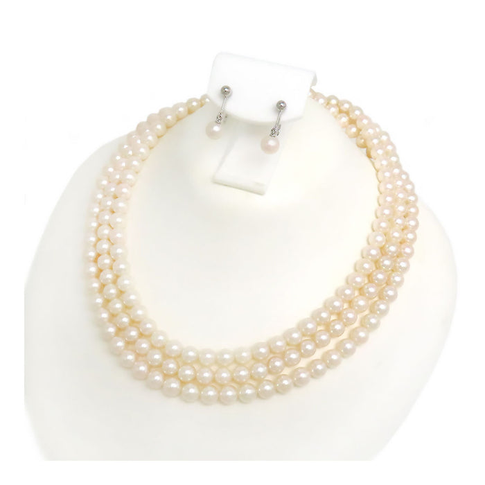 TASAKI 
Ensemble collier long en perles Akoya et boucles d'oreilles