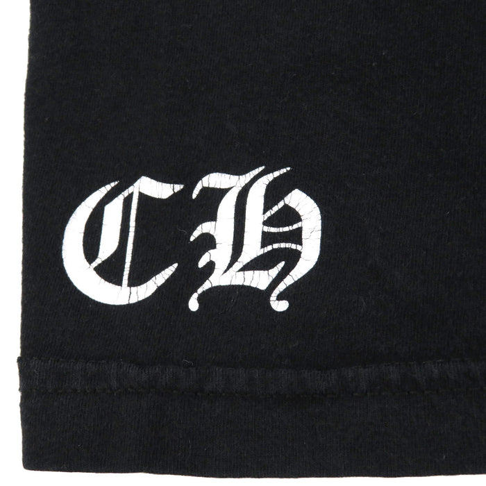 CUORI DI CROMO 
MAGLIA A MANICHE CORTE CON MOTIVO A FIORE E VOLUTE IN COTONE 
MAGLIA A MANICHE CORTE CON STAMPA A FIORE A CAMPANA