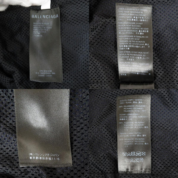 BALENCIAGA  
Half-zip  
Emblem Nylon Anorak Hoodie